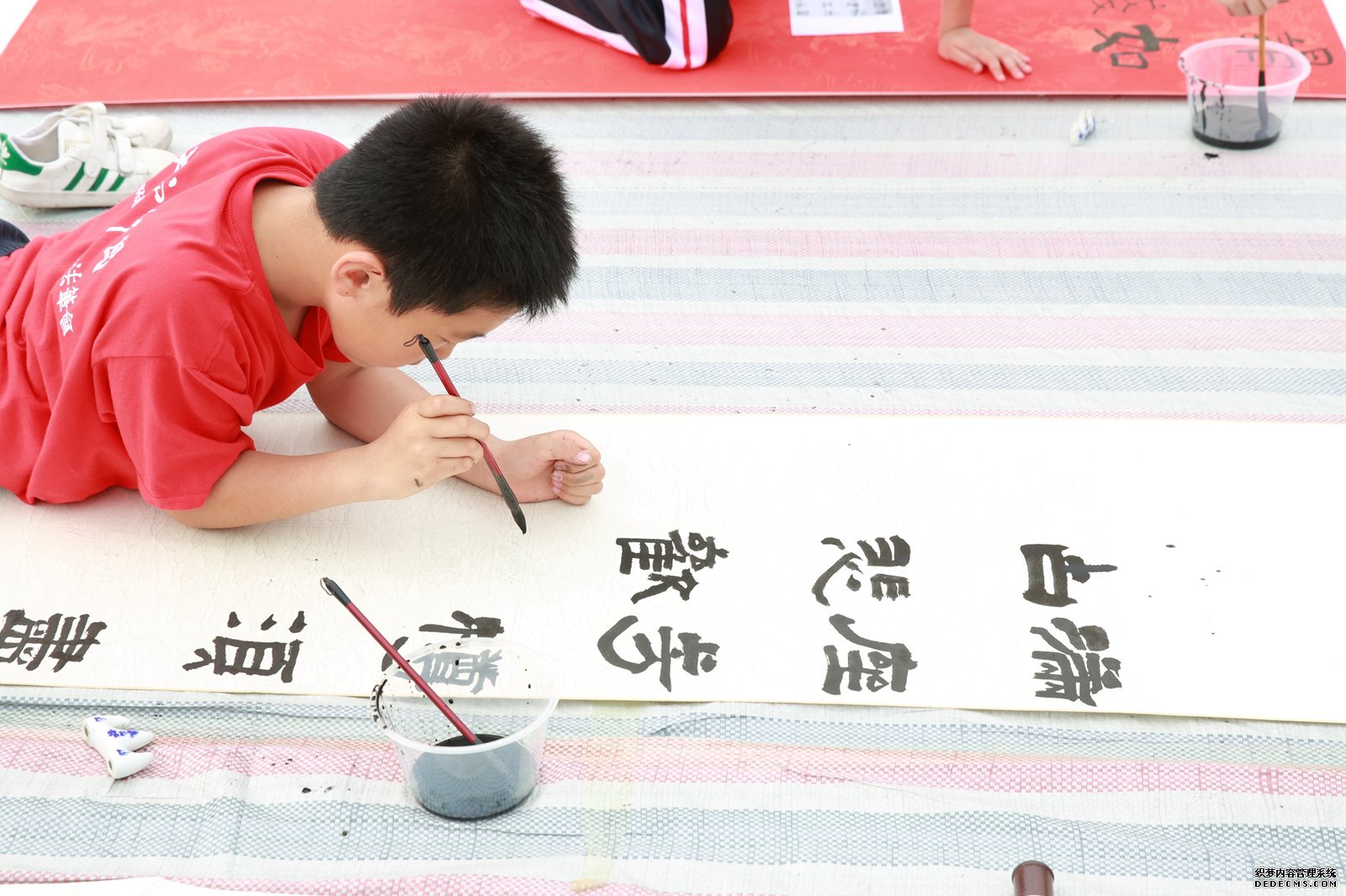 千人书法书写活动在首都师范大学附属小学举行